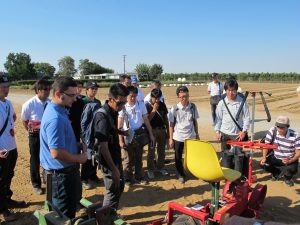 Japanese visitors assess SynTech's trials equipment
